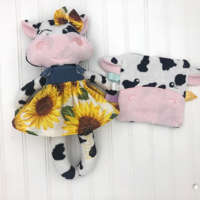 The sweetest custom cow gift set. I love the bright sunflowers with the cow print.  #customdolls 
#farmbabygifts