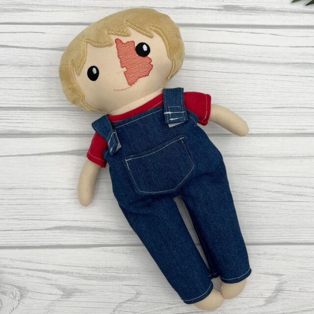 Custom doll with a port wine stain birthmark. I love the simple red shirt with the overalls. 

_____details______
15” custom birthmark doll 
Light skin
Dirty blond hair #13
Eyes h and mouth K 
Overalls with tshirt 

#customdoll #portwinestainbirthmark #keepsakegifts #boydolls #handmadedoll #grandsonsareawesome #birthmarksarebeautiful