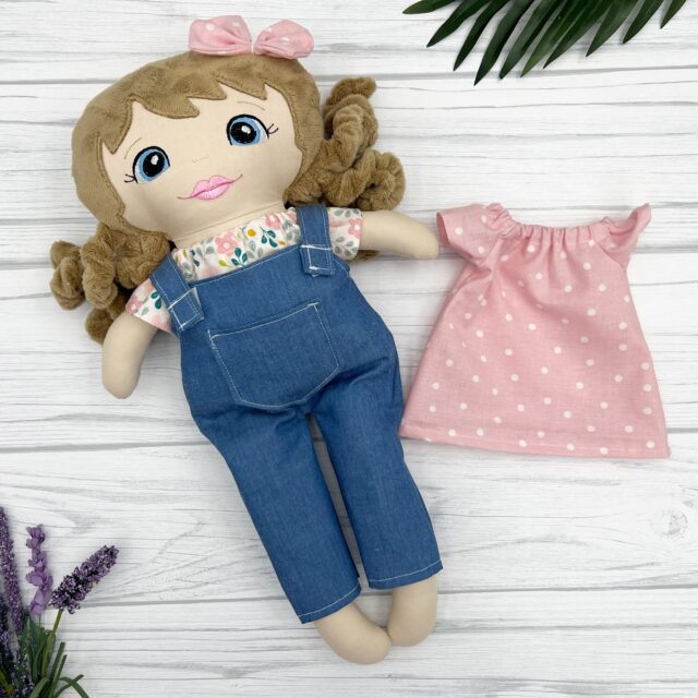 How cute is the curly haired doll with her overalls and second outfit? Beautiful colors. 

#granddaughtersarethebest❤️ #daughtersarethebest #customdoll #bespokedoll #lookalikedoll #personalizeddoll #girlmomma